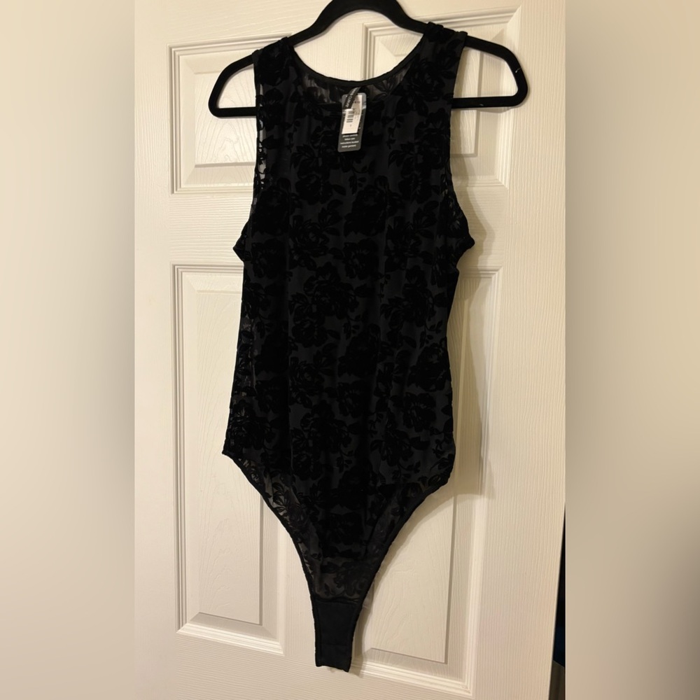 NWT Torrid Black Flocked Mesh Bodysuit size 1/1X (14-16) but runs small - Picture 7 of 9